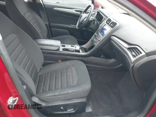 2020 Ford Fusion SE z VIN 3FA6P0T97LR234873, wystawiony jako IAAI lot #41510333 z przebiegiem 65 243 mil mil oraz . Historia ofert i sprzedaży dostępna na DreamBid. Obrazek 5.