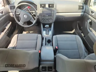 2009 Volkswagen Rabbit S with VIN WVWDB71K79W120196, listed as a Copart auction lot 62126625 with 105,695 mi miles and Salvage title. Bid and sale history available at DreamBid. Image 8.