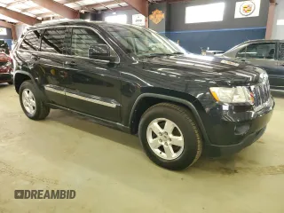 2011 Jeep Grand Cherokee Laredo with VIN 1J4RR4GG9BC521723, listed as a Copart auction lot 64126795 with 198,145 mi miles and Clean title. Bid and sale history available at DreamBid. Image 4.