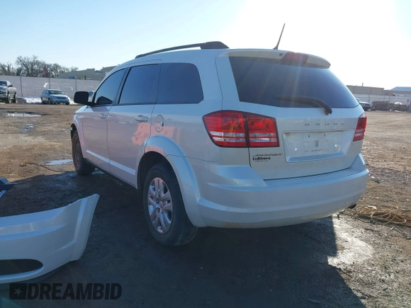 2017 Dodge Journey SE z VIN 3C4PDCAB3HT707029, wystawiony jako IAAI lot #41406306 z przebiegiem 104 046 mil mil oraz . Historia ofert i sprzedaży dostępna na DreamBid. Obrazek 3.