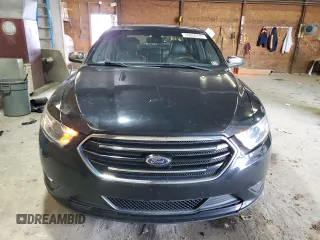 2017 Ford Taurus Limited z VIN 1FAHP2F81HG104822, wystawiony jako Copart lot #55654745 z przebiegiem 219 998 mil mil oraz Czysty tytuł • Clean title. Historia ofert i sprzedaży dostępna na DreamBid. Obrazek 5.