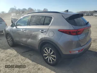 2018 Kia Sportage EX z VIN KNDPNCAC1J7308457, wystawiony jako Copart lot #81574704 z przebiegiem Nie podano mil oraz Szkoda całkowita • Salvage title. Historia ofert i sprzedaży dostępna na DreamBid. Obrazek 2.