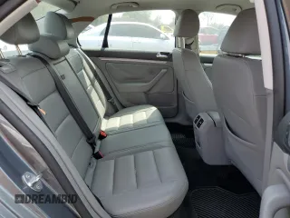 2007 Volkswagen Jetta Wolfsburg Edition z VIN 3VWEG71K07M125028, wystawiony jako Copart lot #53206765 z przebiegiem 53 735 mil mil oraz Czysty tytuł • Clean title. Historia ofert i sprzedaży dostępna na DreamBid. Obrazek 10.