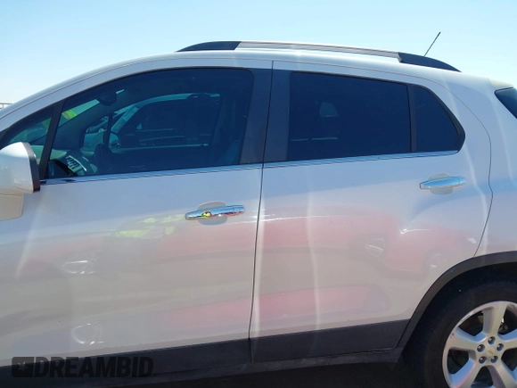 2015 Chevrolet Trax LTZ with VIN KL7CJTSBXFB236823, listed as a IAAI auction lot 42045817 with 138,930 mi miles. Bid and sale history available at carsss.com. Image 15.