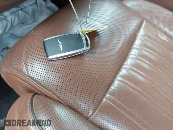 2020 Genesis G90 Ultimate z VIN KMTF54PH1LU081314, wystawiony jako IAAI lot #41642178 z przebiegiem 122 450 mil mil oraz . Historia ofert i sprzedaży dostępna na DreamBid. Obrazek 11.