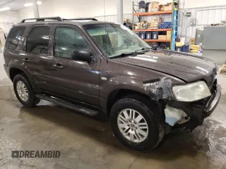 2006 Mercury Mariner Convenience with VIN 4M2YU56Z96KJ14418, listed as a Copart auction lot 47179135 with 163,557 mi miles and Salvage title. Bid and sale history available at DreamBid. Image 4.