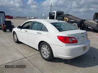 2008 Chrysler Sebring with VIN 1C3LC66J68N284521, listed as a IAAI auction lot 41508199 with 217,216 mi miles and . Bid and sale history available at DreamBid. Image 3.