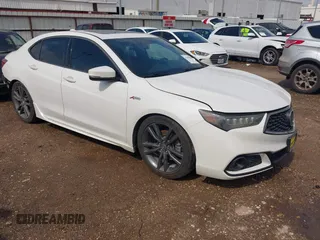 2018 Acura TLX w/A-SPEC Pkg with VIN 19UUB2F67JA008631, listed as a IAAI auction lot 42039884 with 106,680 mi miles and . Bid and sale history available at DreamBid. Image 1.