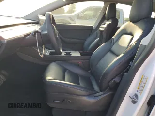 2022 Tesla Model Y Long Range with VIN 7SAYGAEE7NF376795, listed as a Copart auction lot 55113135 with 66,796 mi miles and Salvage Title. Bid and sale history available at carsss.com. Image 7.
