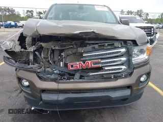 2015 GMC Canyon 2WD SLE with VIN 1GTG5BE38F1229799, listed as a IAAI auction lot 41944801 with 71,165 mi miles. Bid and sale history available at carsss.com. Image 6.