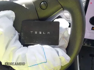 2020 Tesla Model 3 Standard Range Plus with VIN 5YJ3E1EA0LF660759, listed as a IAAI auction lot 41505250 with 63,322 mi miles and . Bid and sale history available at DreamBid. Image 11.