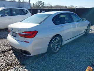2017 BMW 7 Series 750i with VIN WBA7F0C34HGM21738, listed as a IAAI auction lot 41772933 with 62,923 mi miles and . Bid and sale history available at carsss.com. Image 4.