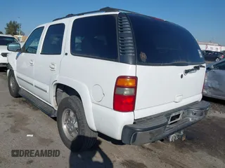 2002 Chevrolet Tahoe LS z VIN 1GNEC13TX2R240719, wystawiony jako IAAI lot #41616356 z przebiegiem 235 081 mil mil oraz . Historia ofert i sprzedaży dostępna na DreamBid. Obrazek 3.