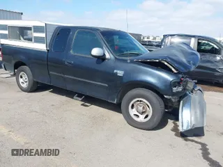 2002 Ford F-150 XL with VIN 1FTRX17L02NB79722, listed as a IAAI auction lot 41538404 with 202,050 mi miles. Bid and sale history available at carsss.com. Image 1.