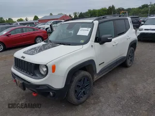 2017 Jeep Renegade Trailhawk with VIN ZACCJBCB5HPE81453, listed as a IAAI auction lot 42324446 with 99,710 mi miles and . Bid and sale history available at DreamBid. Image 2.