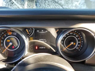 2021 Jeep Wrangler Sport S with VIN 1C4GJXANXMW638080, listed as a Copart auction lot 82543314 with 49,003 mi miles and Salvage Title. Bid and sale history available at DreamBid. Image 9.