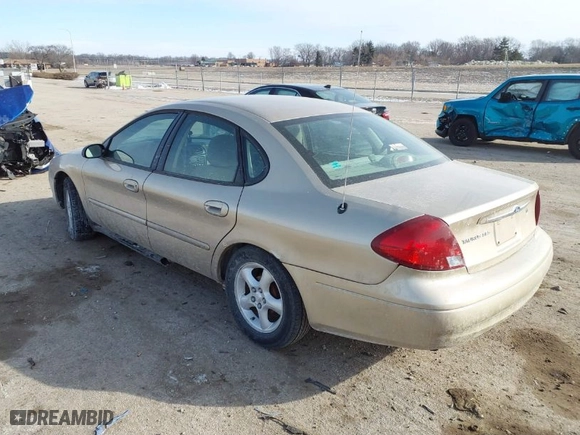 2001 Ford Taurus SES with VIN 1FAFP55U21G219295, listed as a IAAI auction lot 41568715 with 109,852 mi miles. Bid and sale history available at carsss.com. Image 3.