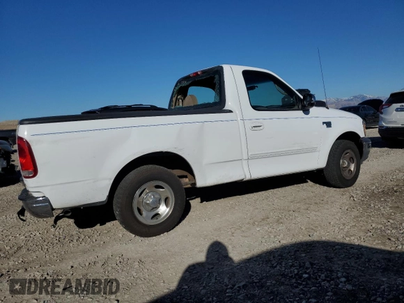 2001 Ford F-150 XL with VIN 1FTRF17L71KF23792, listed as a Copart auction lot 79770894 with Not provided miles and Salvage title. Bid and sale history available at DreamBid. Image 3.