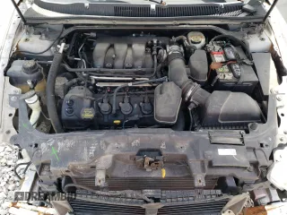 2014 Ford Taurus Limited with VIN 1FAHP2F83EG106227, listed as a Copart auction lot 63055365 with 194,026 mi miles and Salvage title. Bid and sale history available at DreamBid. Image 11.