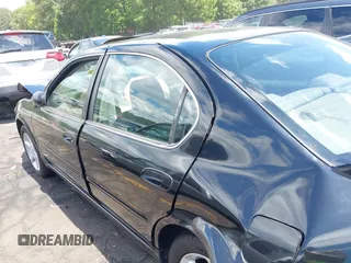 2002 Nissan Maxima GXE z VIN JN1DA31DX2T411198, wystawiony jako IAAI lot #42188090 z przebiegiem Nie podano mil oraz . Historia ofert i sprzedaży dostępna na DreamBid. Obrazek 14.
