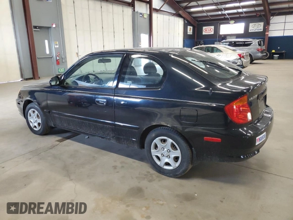 2005 Hyundai Accent GLS with VIN KMHCG35C95U327960, listed as a Copart auction lot 77151314 with 101,556 mi miles and Clean Title. Bid and sale history available at carsss.com. Image 2.