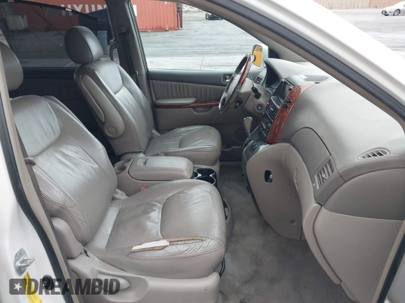 2004 Toyota Sienna XLE with VIN 5TDZA22C94S084569, listed as a IAAI auction lot 41482040 with 210,157 mi miles and . Bid and sale history available at DreamBid. Image 5.