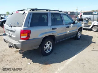 2001 Jeep Grand Cherokee Laredo with VIN 1J4GW48S61C662315, listed as a IAAI auction lot 42002235 with 166,901 mi miles. Bid and sale history available at carsss.com. Image 4.