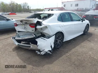 2023 Toyota Camry SE with VIN 4T1G11AK7PU771765, listed as a IAAI auction lot 42060929 with 39,407 mi miles and . Bid and sale history available at DreamBid. Image 4.
