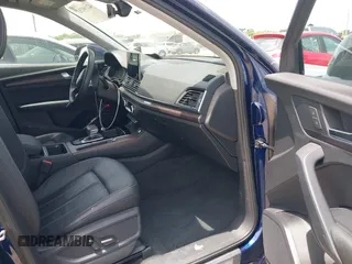 2021 Audi Q5 Premium with VIN WA1AAAFY7M2004975, listed as a IAAI auction lot 42190283 with 56,810 mi miles and . Bid and sale history available at DreamBid. Image 5.