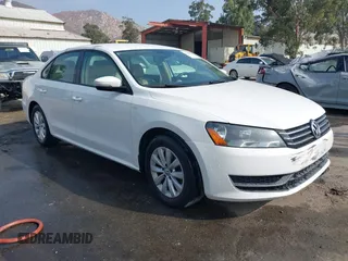 2014 Volkswagen Passat S with VIN 1VWAT7A35EC117895, listed as a IAAI auction lot 42561998 with 157,300 mi miles and . Bid and sale history available at DreamBid. Image 1.