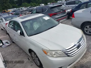 2012 Toyota Avalon with VIN 4T1BK3DB9CU454725, listed as a IAAI auction lot 42286174 with 122,501 mi miles and . Bid and sale history available at DreamBid. Image 1.