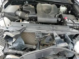 2021 Toyota Tacoma SR with VIN 5TFCZ5AN9MX254944, listed as a Copart auction lot 69795365 with 55,111 mi miles and Salvage title. Bid and sale history available at DreamBid. Image 14.