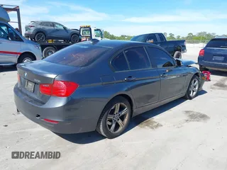 2015 BMW 3 Series 328i xDrive with VIN WBA3B5G54FNS19686, listed as a IAAI auction lot 41431980 with 74,613 mi miles and . Bid and sale history available at DreamBid. Image 4.