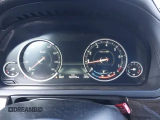 2014 BMW 7 Series 740i with VIN WBAYA6C53ED144195, listed as a IAAI auction lot 41720500 with 123,776 mi miles and . Bid and sale history available at DreamBid. Image 7.