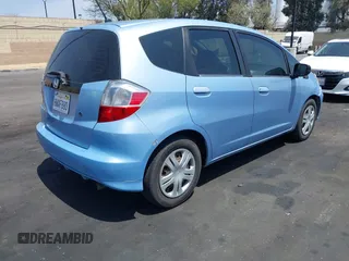 2010 Honda Fit z VIN JHMGE8H23AC026868, wystawiony jako IAAI lot #42121067 z przebiegiem 207 378 mil mil oraz . Historia ofert i sprzedaży dostępna na DreamBid. Obrazek 4.