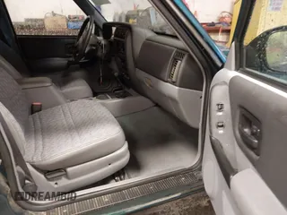 1997 Jeep Cherokee Sport with VIN 1J4FJ68S9VL594152, listed as a IAAI auction lot 41732573 with 65,316 mi miles. Bid and sale history available at carsss.com. Image 5.