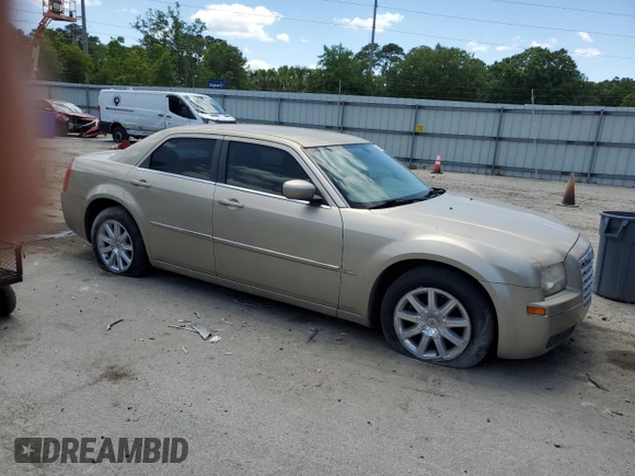2009 Chrysler 300 Touring with VIN 2C3KA53V69H592639, listed as a Copart auction lot 55209775 with 107,751 mi miles and Salvage Title. Bid and sale history available at DreamBid. Image 4.