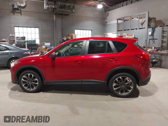 2016 Mazda CX-5 Grand Touring with VIN JM3KE4DY6G0690923, listed as a IAAI auction lot 41875553 with 179,489 mi miles. Bid and sale history available at carsss.com. Image 14.