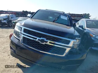2018 Chevrolet Suburban LT with VIN 1GNSKHKCXJR268938, listed as a IAAI auction lot 41672886 with 76,844 mi miles and . Bid and sale history available at DreamBid. Image 12.