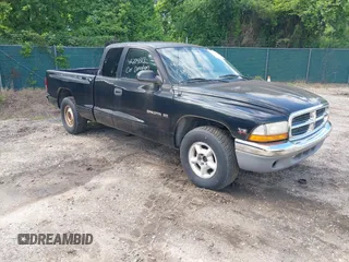 1998 Dodge Dakota SLT z VIN 1B7GL22X0WS731035, wystawiony jako IAAI lot #42279313 z przebiegiem 219 039 mil mil oraz . Historia ofert i sprzedaży dostępna na DreamBid. Obrazek 1.