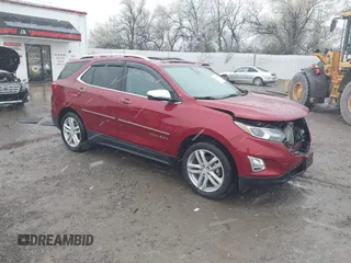 2018 Chevrolet Equinox Premier with VIN 2GNAXVEVXJ6115268, listed as a IAAI auction lot 40881577 with 61,910 mi miles and . Bid and sale history available at DreamBid. Image 1.