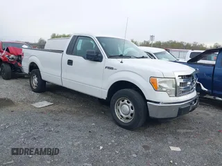 2013 Ford F-150 XL with VIN 1FTNF1CFXDKF22588, listed as a IAAI auction lot 41912246 with 124,416 mi miles. Bid and sale history available at carsss.com. Image 1.