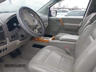 2005 Infiniti QX56 with VIN 5N3AA08AX5N810084, listed as a IAAI auction lot 41862041 with 168,958 mi miles. Bid and sale history available at carsss.com. Image 5.