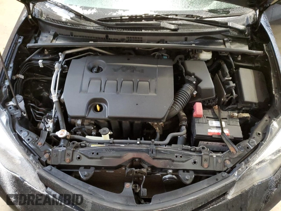 2019 Toyota Corolla L z VIN 2T1BURHE6KC152553, wystawiony jako Copart lot #61573735 z przebiegiem 102 006 mil mil oraz Szkoda całkowita • Salvage title. Historia ofert i sprzedaży dostępna na DreamBid. Obrazek 11.