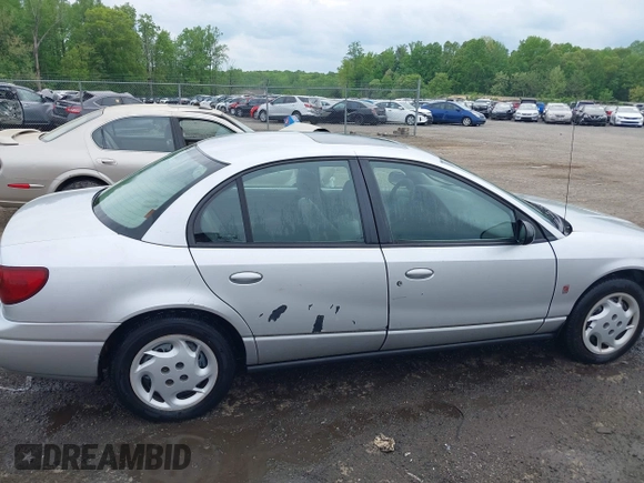 2002 Saturn SL z VIN 1G8ZK52762Z131497, wystawiony jako IAAI lot #42086108 z przebiegiem 119 273 mil mil oraz . Historia ofert i sprzedaży dostępna na DreamBid. Obrazek 6.