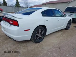 2014 Dodge Charger SXT with VIN 2C3CDXJG9EH255078, listed as a IAAI auction lot 41880363 with 124,864 mi miles. Bid and sale history available at carsss.com. Image 4.