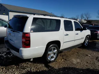 2013 Chevrolet Suburban LTZ with VIN 1GNSCKE07DR331719, listed as a Copart auction lot 42025335 with 221,584 mi miles and Salvage Title. Bid and sale history available at carsss.com. Image 3.