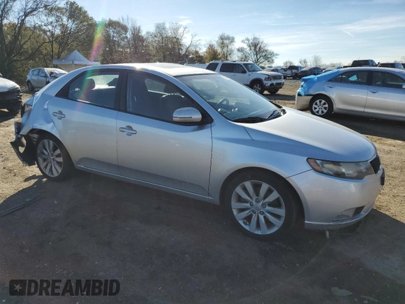 2011 Kia Forte SX with VIN KNAFW4A35B5396891, listed as a Copart auction lot 77180464 with 243,502 mi miles and Salvage Title. Bid and sale history available at carsss.com. Image 4.