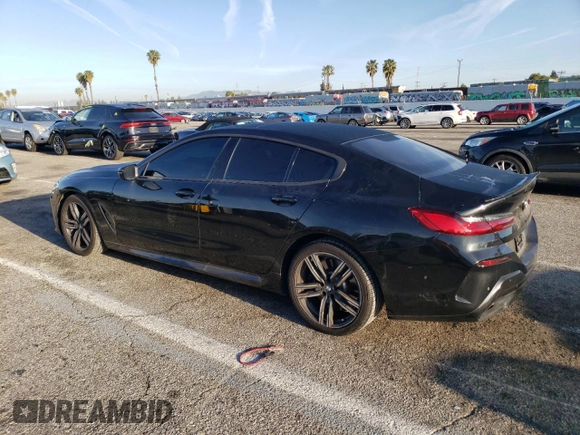 2020 BMW 8 Series 840i with VIN WBAGV4C06LCE28998, listed as a Copart auction lot 48566634 with 54,946 mi miles and Salvage title. Bid and sale history available at DreamBid. Image 2.