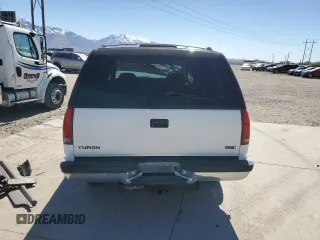 1999 GMC Yukon with VIN 1GKEC13R4XJ809507, listed as a Copart auction lot 50922655 with 227,923 mi miles and Salvage Title. Bid and sale history available at carsss.com. Image 6.